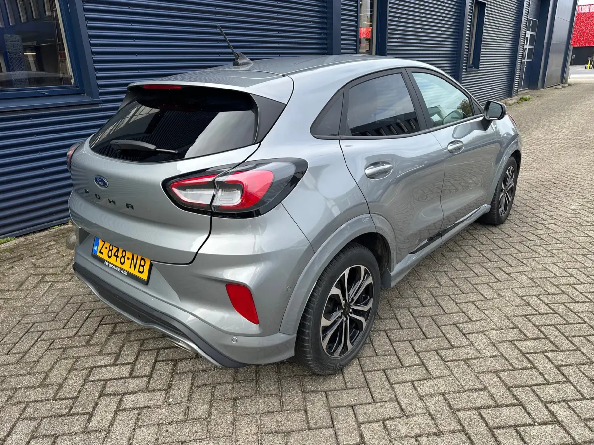1.0 EcoBoost ST-Line | Carplay | Navigatie | Stoel/Stuurverwarming | Climate Control | Adaptieve Cruise | Achterbank in delen neerklapbaar | Achteruitrijcamera | Airco (automatisch)