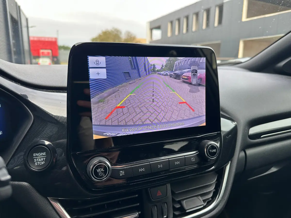 1.0 EcoBoost ST-Line | Carplay | Navigatie | Stoel/Stuurverwarming | Climate Control | Adaptieve Cruise | Achterbank in delen neerklapbaar | Achteruitrijcamera | Airco (automatisch)