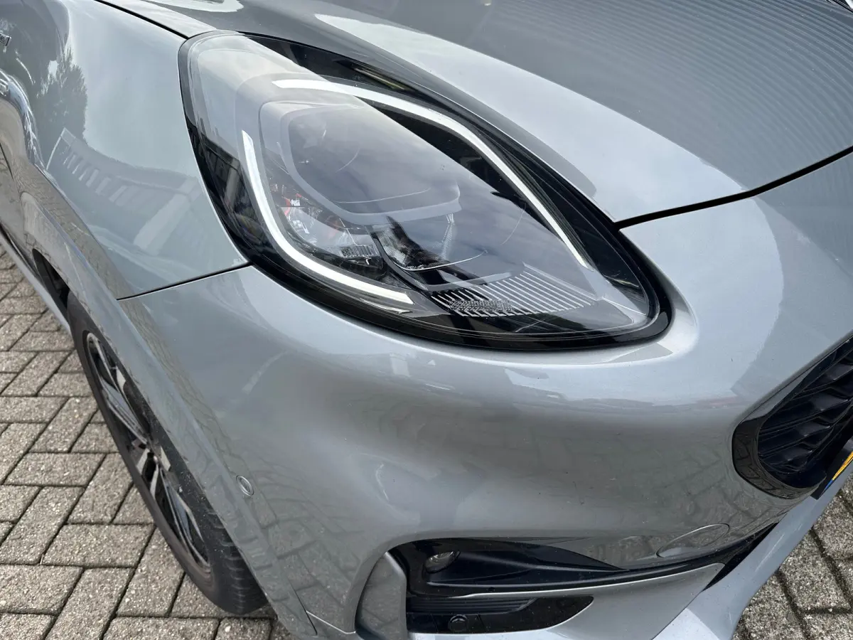 1.0 EcoBoost ST-Line | Carplay | Navigatie | Stoel/Stuurverwarming | Climate Control | Adaptieve Cruise | Achterbank in delen neerklapbaar | Achteruitrijcamera | Airco (automatisch)