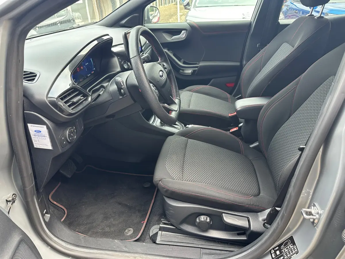 1.0 EcoBoost ST-Line | Carplay | Navigatie | Stoel/Stuurverwarming | Climate Control | Adaptieve Cruise | Achterbank in delen neerklapbaar | Achteruitrijcamera | Airco (automatisch)