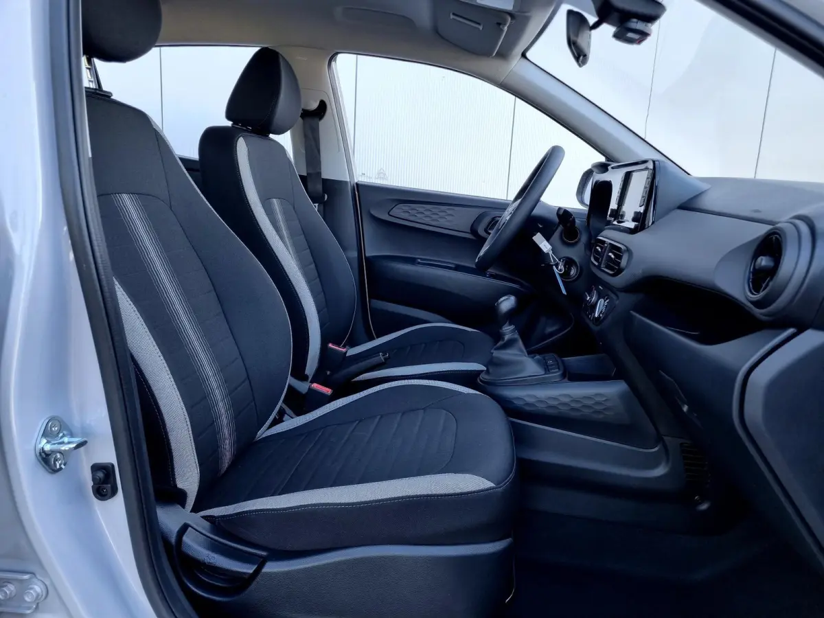 1.0 Comfort / Navigatie / Achteruitrijcamera / Parkeersensoren Achter / Airco / Cruise Control / Snel Leverbaar! /