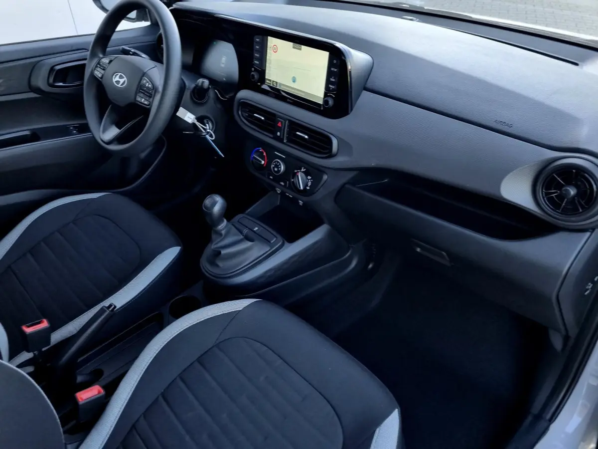 1.0 Comfort / Navigatie / Achteruitrijcamera / Parkeersensoren Achter / Airco / Cruise Control / Snel Leverbaar! /