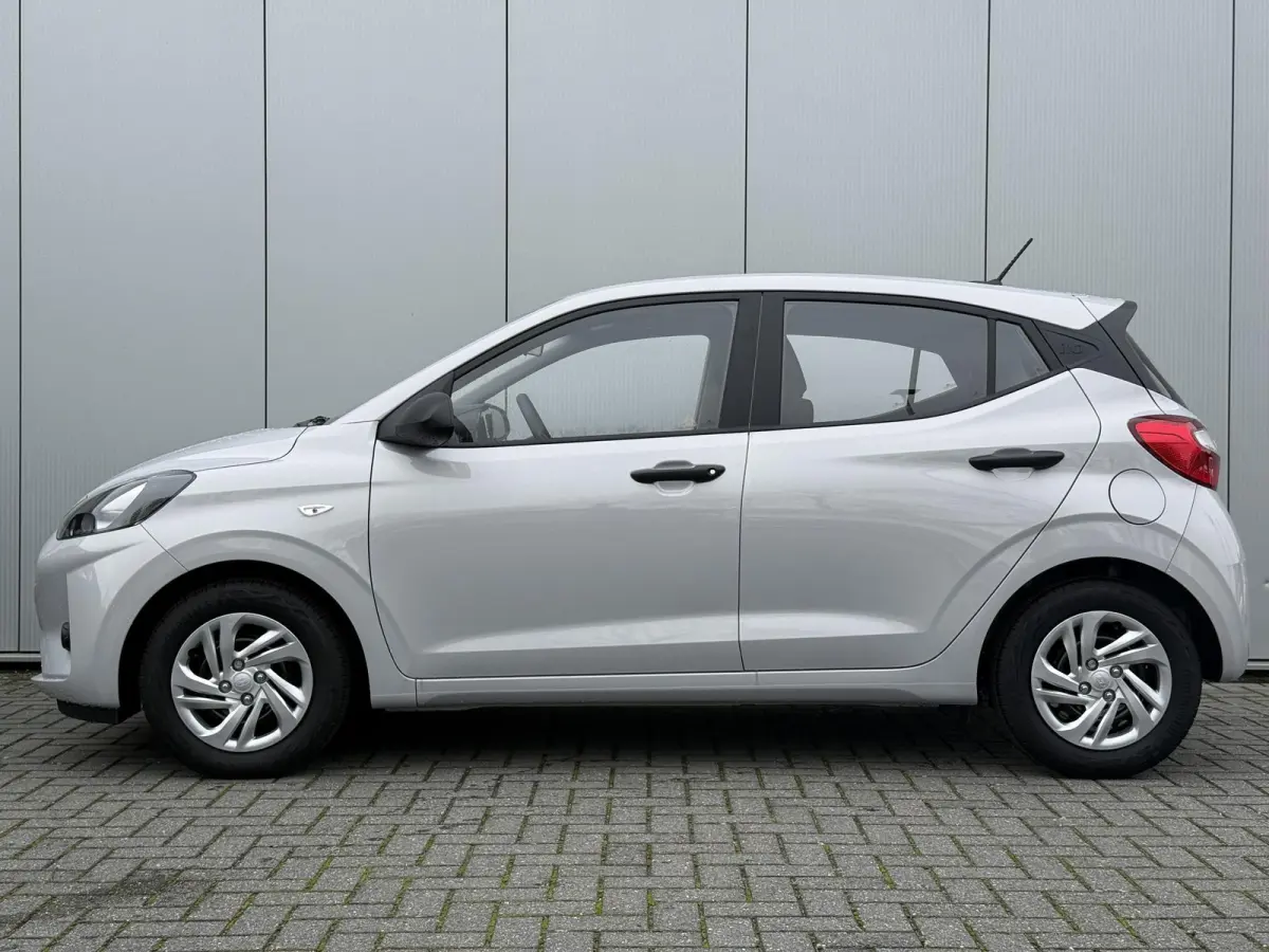 1.0 Comfort / Navigatie / Achteruitrijcamera / Parkeersensoren Achter / Airco / Cruise Control / Snel Leverbaar! /
