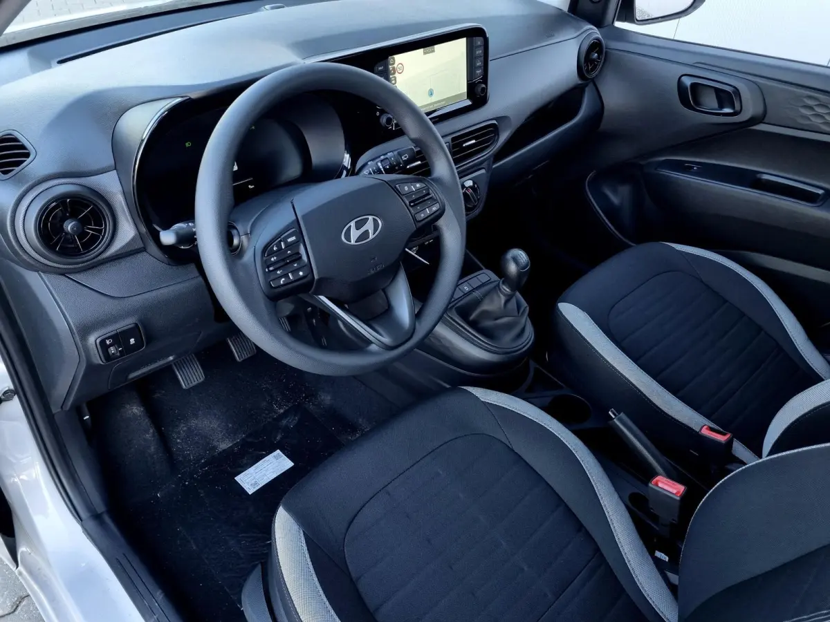 1.0 Comfort / Navigatie / Achteruitrijcamera / Parkeersensoren Achter / Airco / Cruise Control / Snel Leverbaar! /