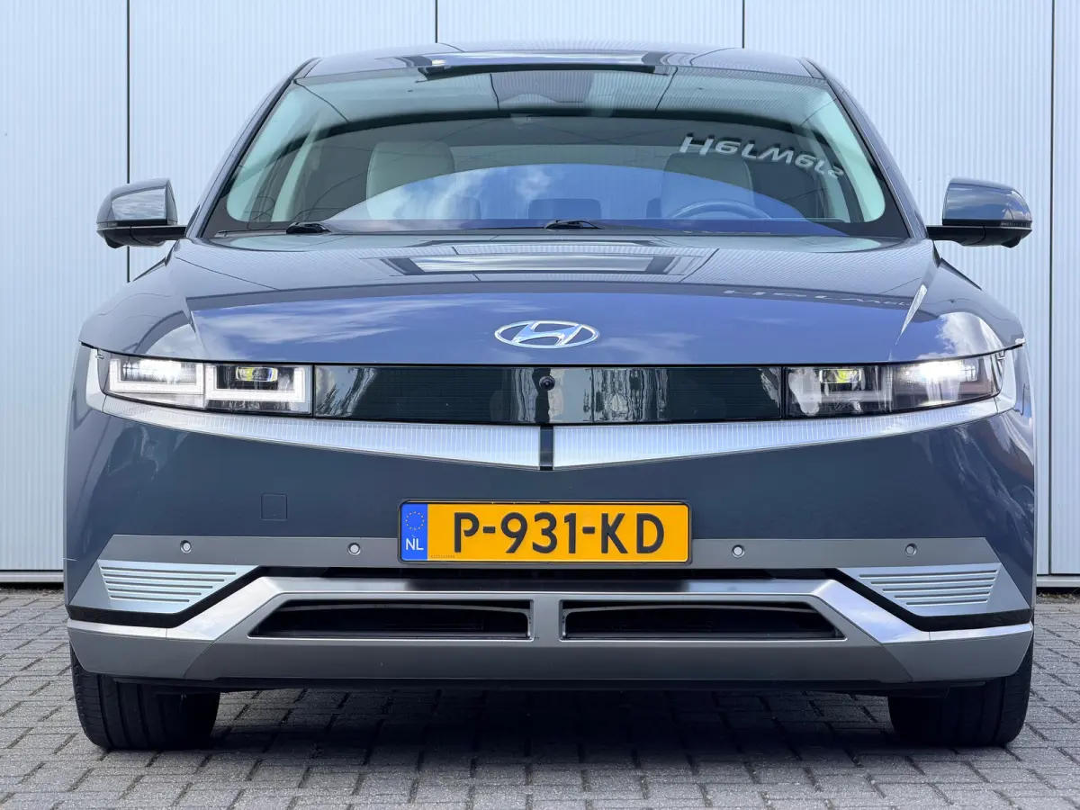 Lounge 58 kWh / NL Auto / Wit Leder / Dynamische Navigatie / 360 Camera / Memory Seat / Stoelverkoeling / Stoelverwarming Voor + Achter / Stuurverwarming / | Achterbank in delen neerklapbaar