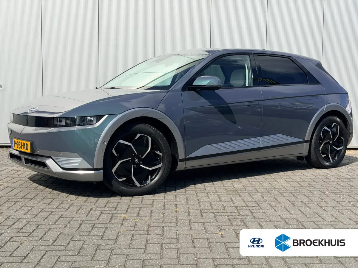 Lounge 58 kWh / NL Auto / Wit Leder / Dynamische Navigatie / 360 Camera / Memory Seat / Stoelverkoeling / Stoelverwarming Voor + Achter / Stuurverwarming / | Achterbank in delen neerklapbaar