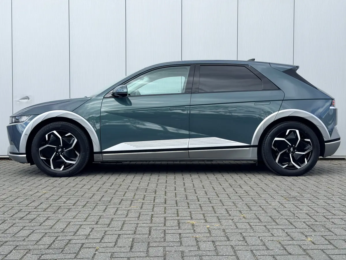 Lounge 58 kWh / NL Auto / Wit Leder / Dynamische Navigatie / 360 Camera / Memory Seat / Stoelverkoeling / Stoelverwarming Voor + Achter / Stuurverwarming / | Achterbank in delen neerklapbaar