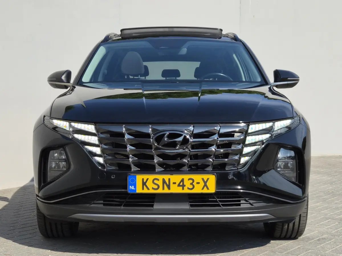 1.6 T-GDI PHEV Comfort Smart Sky 4WD / Dealeronderhouden / Fabrieksgarantie tot 06-2027 / Glazen schuif- en kanteldak / Stuur- & Stoelverwarming / Trekgewicht 1350 kg / Adaptief cruise contr