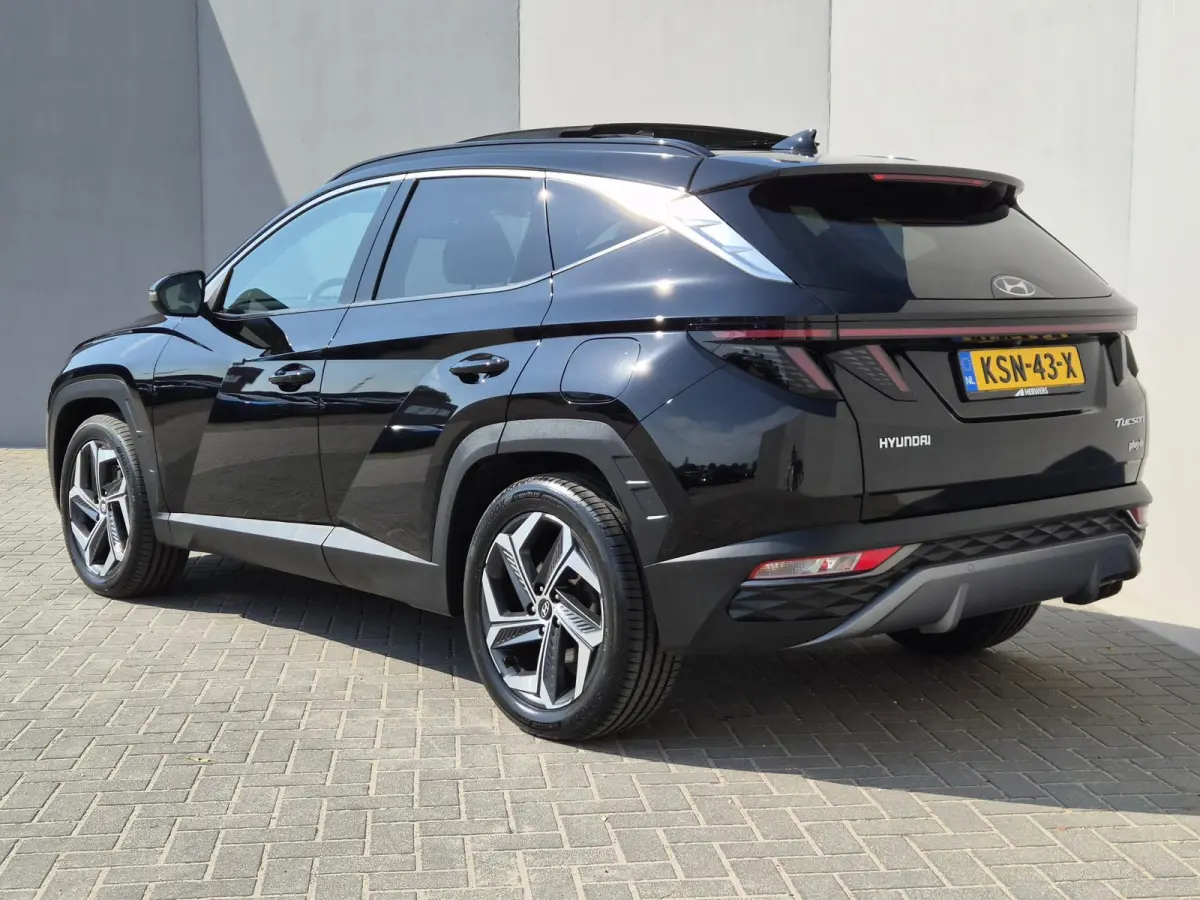 1.6 T-GDI PHEV Comfort Smart Sky 4WD / Dealeronderhouden / Fabrieksgarantie tot 06-2027 / Glazen schuif- en kanteldak / Stuur- & Stoelverwarming / Trekgewicht 1350 kg / Adaptief cruise contr
