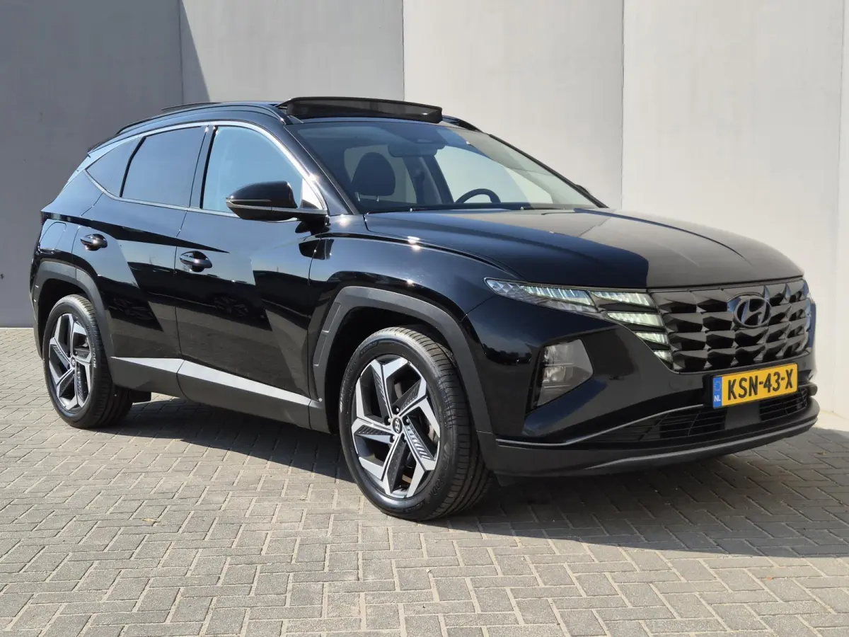 1.6 T-GDI PHEV Comfort Smart Sky 4WD / Dealeronderhouden / Fabrieksgarantie tot 06-2027 / Glazen schuif- en kanteldak / Stuur- & Stoelverwarming / Trekgewicht 1350 kg / Adaptief cruise contr