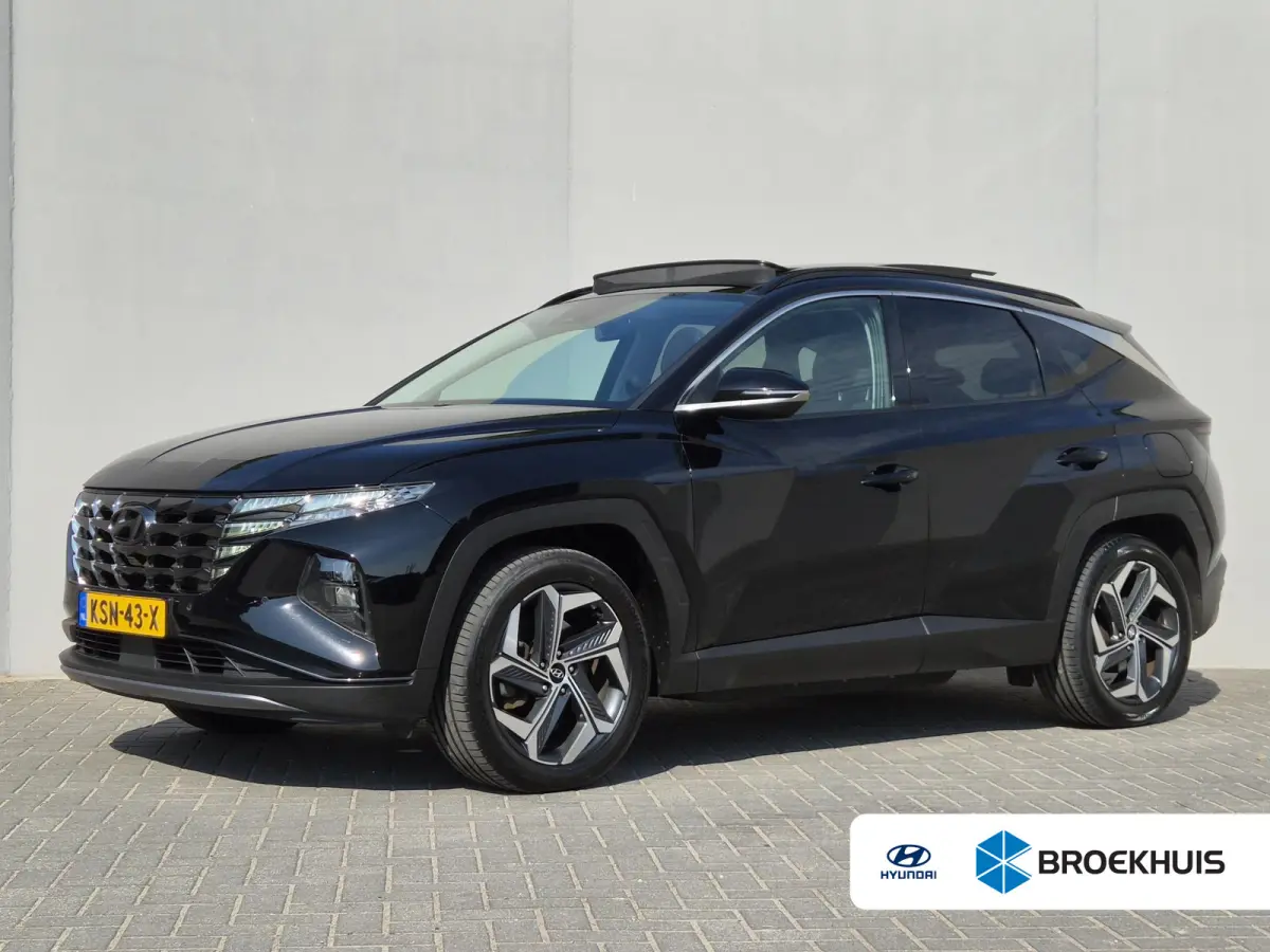 1.6 T-GDI PHEV Comfort Smart Sky 4WD / Dealeronderhouden / Fabrieksgarantie tot 06-2027 / Glazen schuif- en kanteldak / Stuur- & Stoelverwarming / Trekgewicht 1350 kg / Adaptief cruise contr