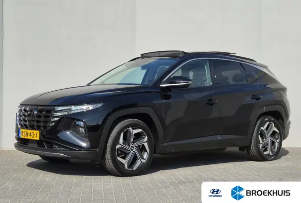 1.6 T-GDI PHEV Comfort Smart Sky 4WD / Dealeronderhouden / Fabrieksgarantie tot 06-2027 / Glazen schuif- en kanteldak / Stuur- & Stoelverwarming / Trekgewicht 1350 kg / Adaptief cruise contr