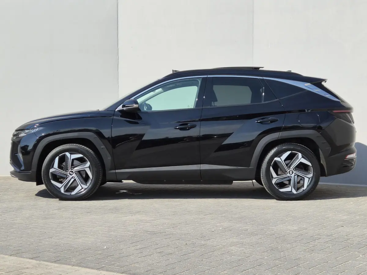 1.6 T-GDI PHEV Comfort Smart Sky 4WD / Dealeronderhouden / Fabrieksgarantie tot 06-2027 / Glazen schuif- en kanteldak / Stuur- & Stoelverwarming / Trekgewicht 1350 kg / Adaptief cruise contr