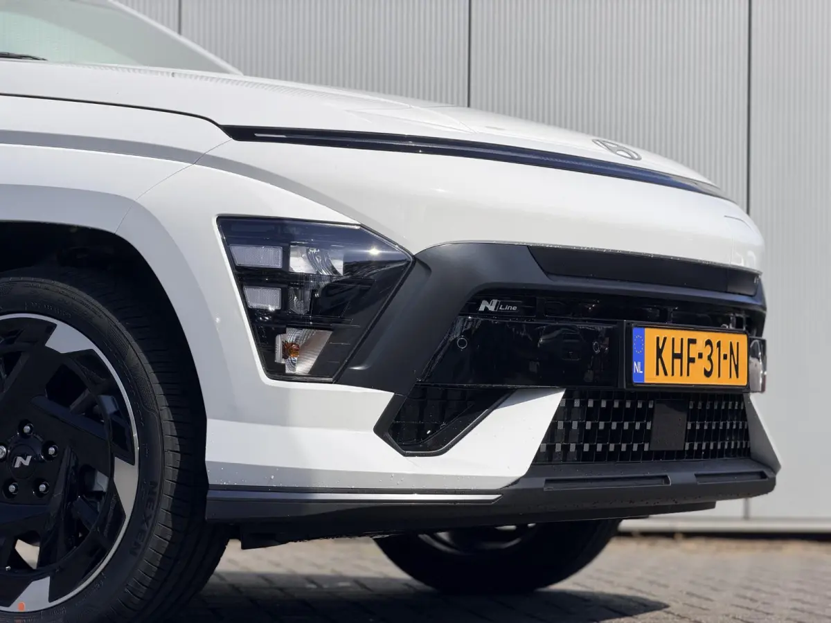 N Line Business 64.8 kWh / Warmtepomp / BOSE Audio / V2L Interieur / Achteruitrijcamera / Parkeersensoren Voor + Achter / Stoel- & Stuurverwarming / Dodehoekdetectie /