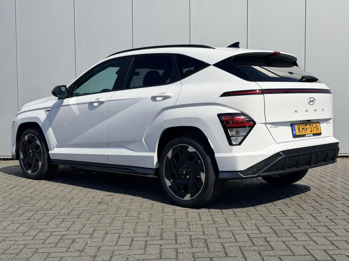 N Line Business 64.8 kWh / Warmtepomp / BOSE Audio / V2L Interieur / Achteruitrijcamera / Parkeersensoren Voor + Achter / Stoel- & Stuurverwarming / Dodehoekdetectie /