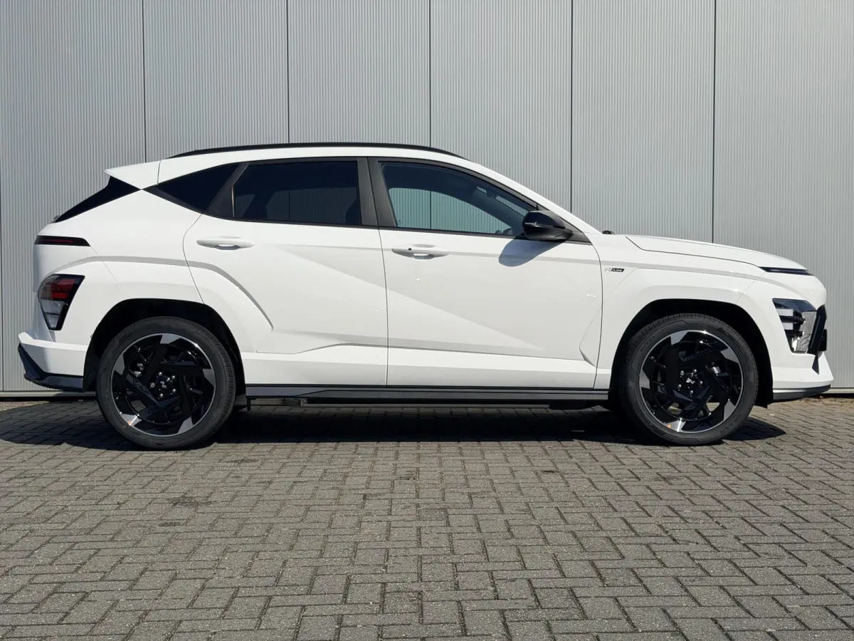 N Line Business 64.8 kWh / Warmtepomp / BOSE Audio / V2L Interieur / Achteruitrijcamera / Parkeersensoren Voor + Achter / Stoel- & Stuurverwarming / Dodehoekdetectie /
