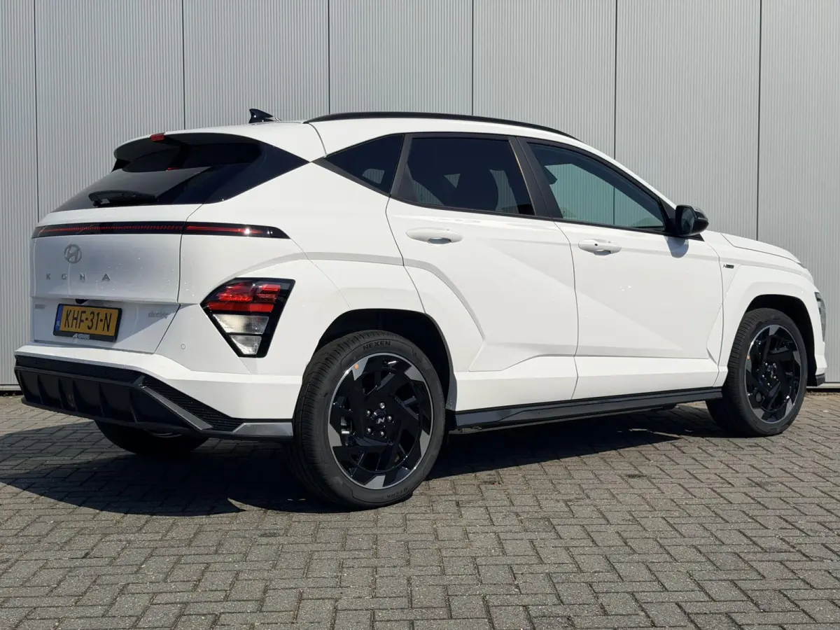 N Line Business 64.8 kWh / Warmtepomp / BOSE Audio / V2L Interieur / Achteruitrijcamera / Parkeersensoren Voor + Achter / Stoel- & Stuurverwarming / Dodehoekdetectie /