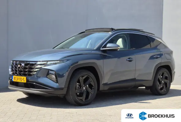 1.6 T-GDI PHEV Premium Sky 4WD / Glazen schuif- en kanteldak / Rondomzicht camera / Trekgewicht 1.350 kg / Elektrische achterklep / Stuur- Stoel & Achterbank verwarming / Adaptief cruise con