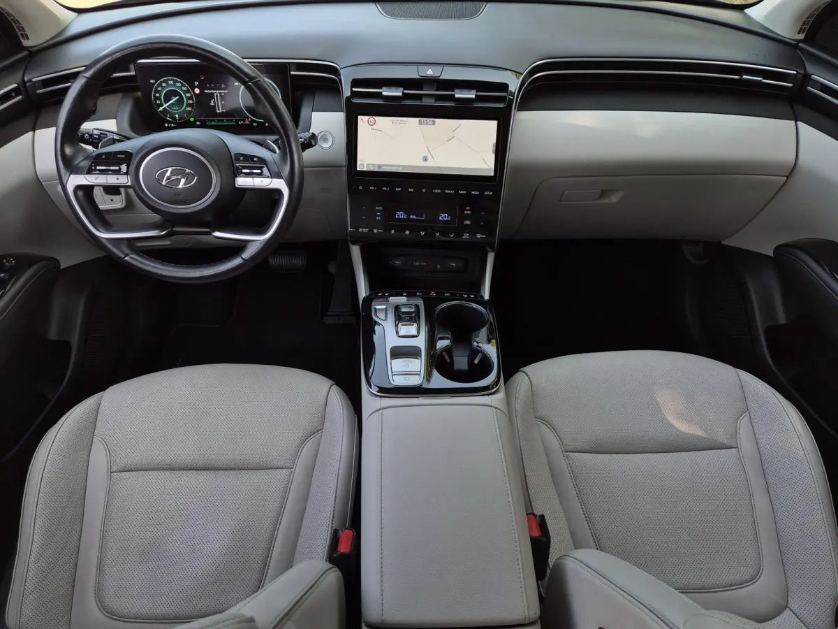 1.6 T-GDI PHEV Premium Sky 4WD / Glazen schuif- en kanteldak / Rondomzicht camera / Trekgewicht 1.350 kg / Elektrische achterklep / Stuur- Stoel & Achterbank verwarming / Adaptief cruise con
