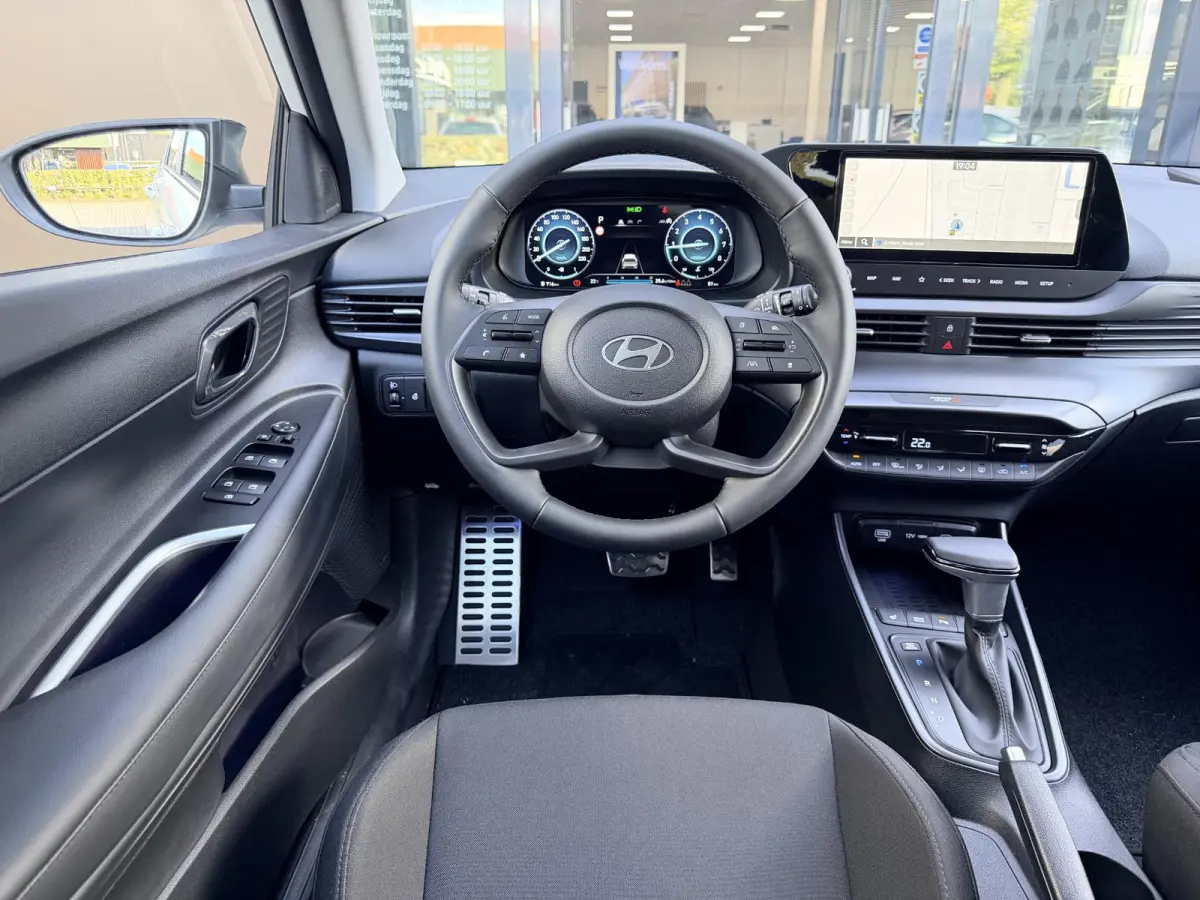 1.0 T-GDI Premium Automaat / Automaat / LED Verlichting / Stoel- & Stuurverwarming / Keyless / Climate Control / Adaptive Cruise Control / Navigatie / Achteruitrijcamera / Parkeersensoren Vo