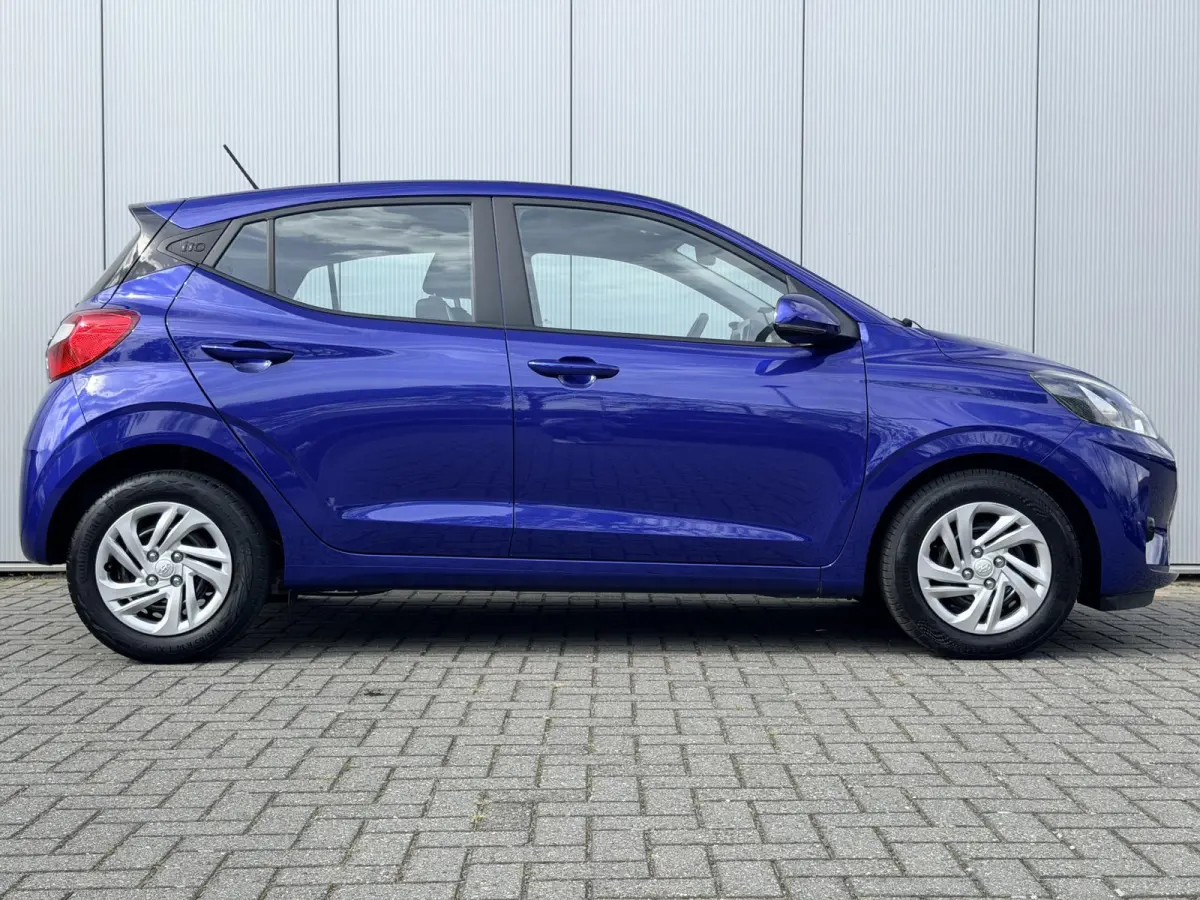 1.0 Comfort Smart / Navigatie / Achteruitrijcamera / Bluelink / Airco / Armsteun / Cruise Control / NL Auto /