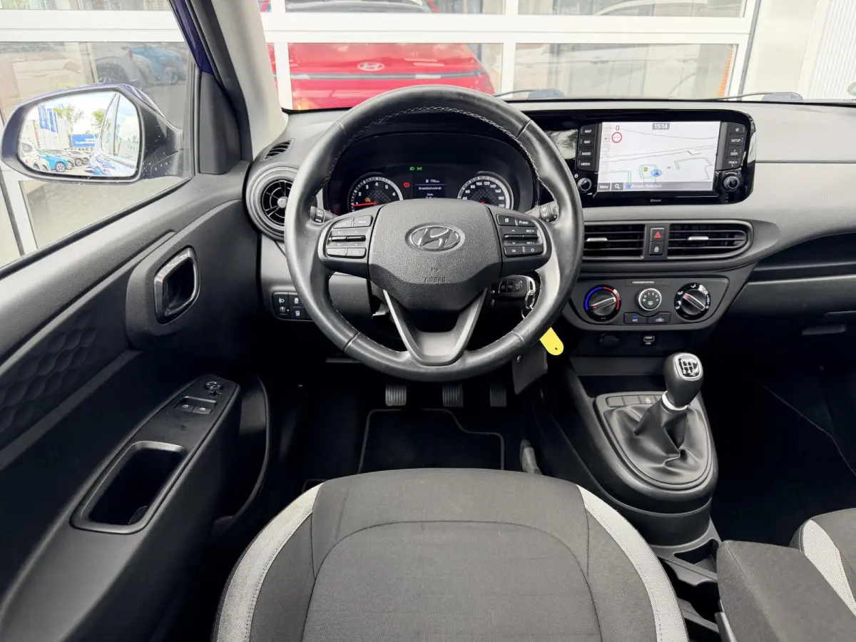 1.0 Comfort Smart / Navigatie / Achteruitrijcamera / Bluelink / Airco / Armsteun / Cruise Control / NL Auto /