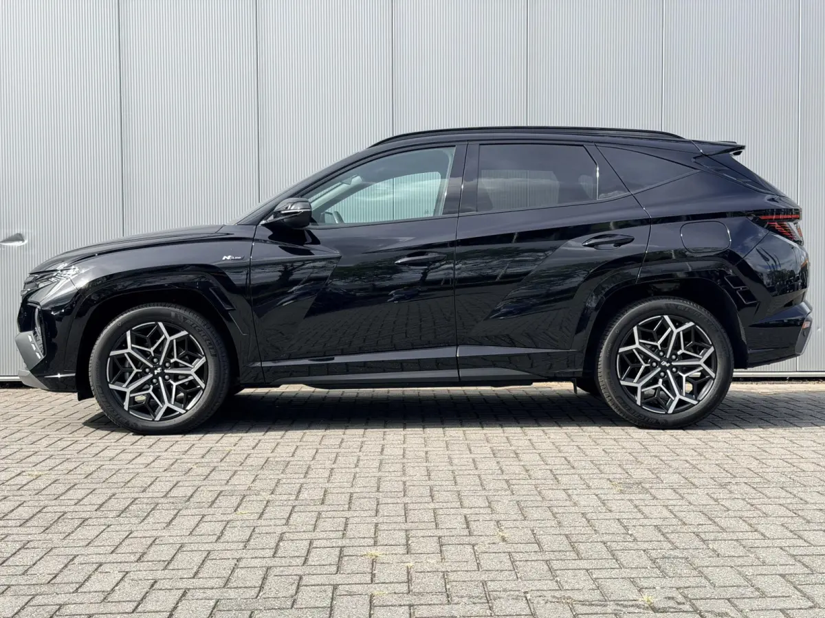 1.6 T-GDI HEV 230pk N Line Edition Automaat / Fabrieksgarantie tot 03-2029 / Dealer onderhouden / Trekgewicht 1650 kg / Stoelverwarming / Achteruitrijcamera / cruise control / Climate contro