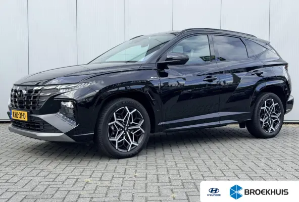 1.6 T-GDI HEV 230pk N Line Edition Automaat / Fabrieksgarantie tot 03-2029 / Dealer onderhouden / Trekgewicht 1650 kg / Stoelverwarming / Achteruitrijcamera / cruise control / Climate contro