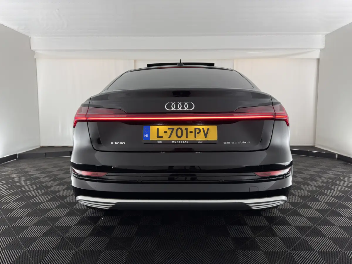 55 Quattro Business Edition Plus 95 kWh [3-Fase-11kW] {SoH-94%} Aut. *HEATPUMP | PANO | LEATHER | ADAPTIVE-CRUISE | MEMORY-PACK | FULL-LED | DIGI-COCKPIT | KEYLESS | CAMERA | PRIVACY-GLASS |