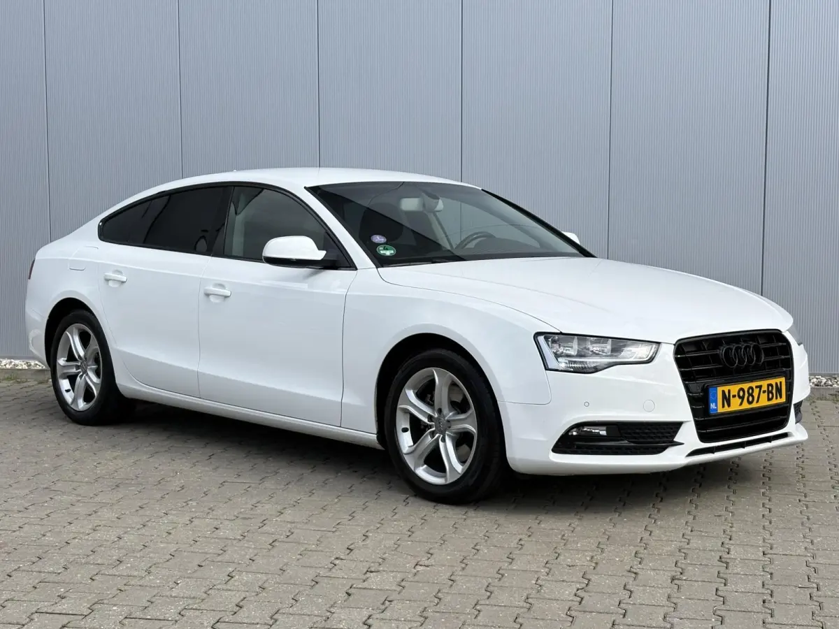1.8 TFSI Business Edition / Trekhaak Geremd 1.500 kg / Navigatie / Cruise control / Airco / Bi-xenon koplampen / | Bi-xenon koplampen | Cruise control | Lendesteunen (verstelbaar)