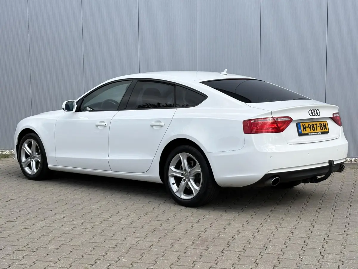 1.8 TFSI Business Edition / Trekhaak Geremd 1.500 kg / Navigatie / Cruise control / Airco / Bi-xenon koplampen / | Bi-xenon koplampen | Cruise control | Lendesteunen (verstelbaar)