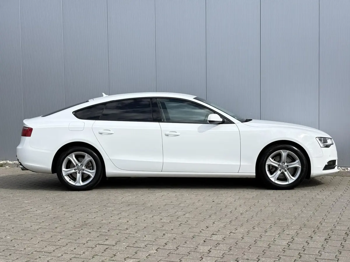 1.8 TFSI Business Edition / Trekhaak Geremd 1.500 kg / Navigatie / Cruise control / Airco / Bi-xenon koplampen / | Bi-xenon koplampen | Cruise control | Lendesteunen (verstelbaar)