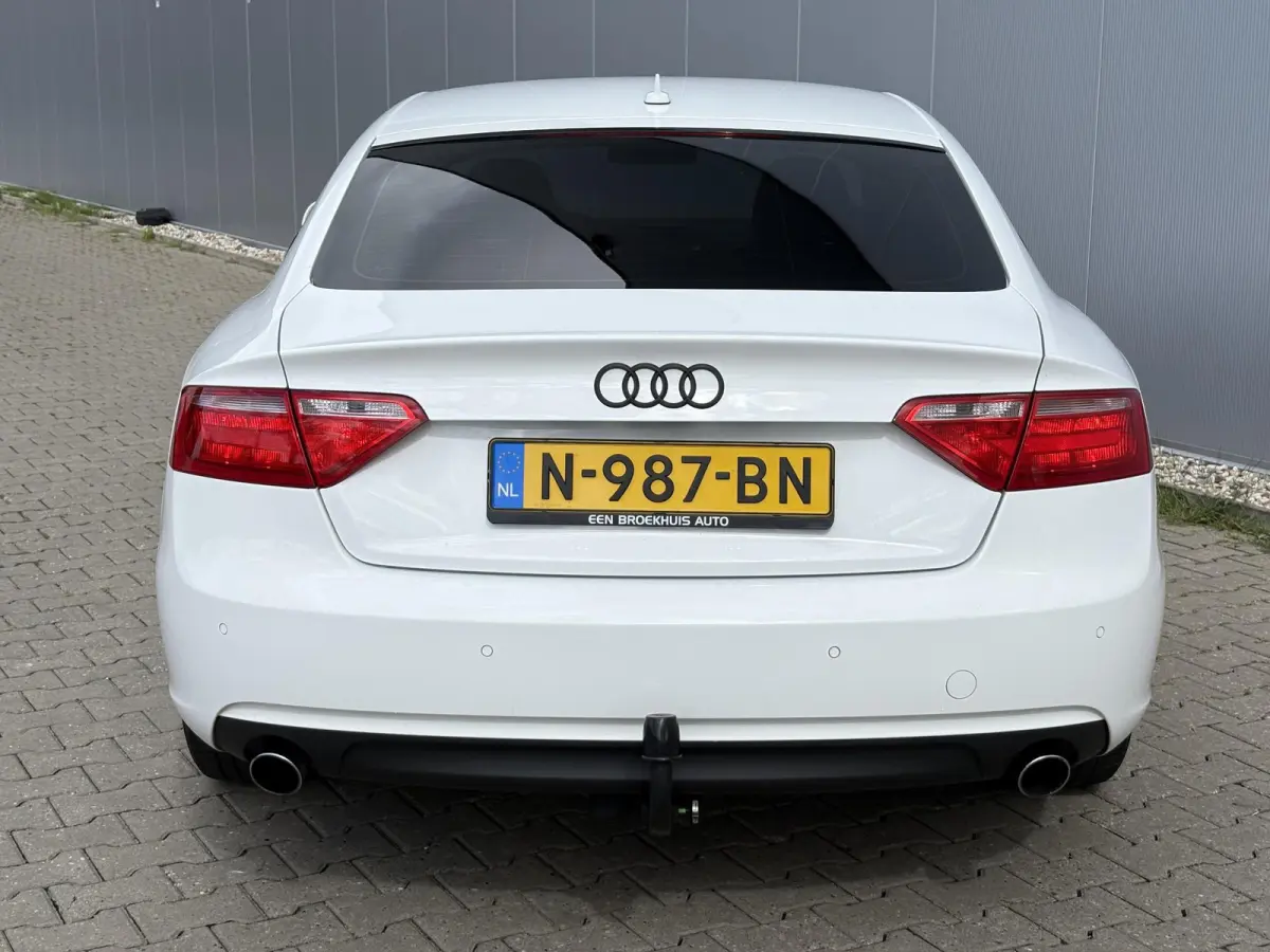 1.8 TFSI Business Edition / Trekhaak Geremd 1.500 kg / Navigatie / Cruise control / Airco / Bi-xenon koplampen / | Bi-xenon koplampen | Cruise control | Lendesteunen (verstelbaar)