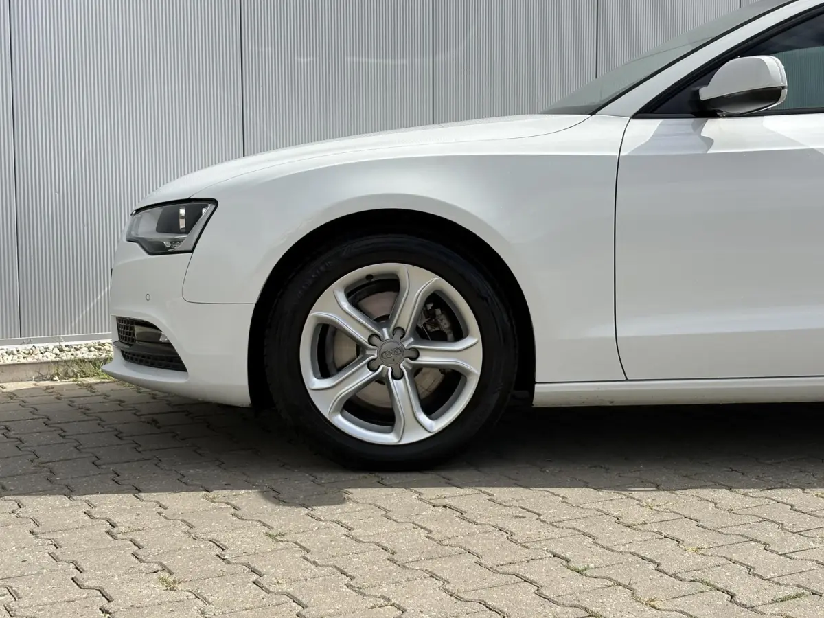 1.8 TFSI Business Edition / Trekhaak Geremd 1.500 kg / Navigatie / Cruise control / Airco / Bi-xenon koplampen / | Bi-xenon koplampen | Cruise control | Lendesteunen (verstelbaar)