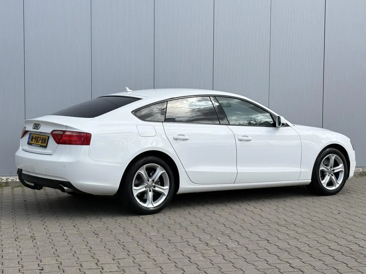 1.8 TFSI Business Edition / Trekhaak Geremd 1.500 kg / Navigatie / Cruise control / Airco / Bi-xenon koplampen / | Bi-xenon koplampen | Cruise control | Lendesteunen (verstelbaar)
