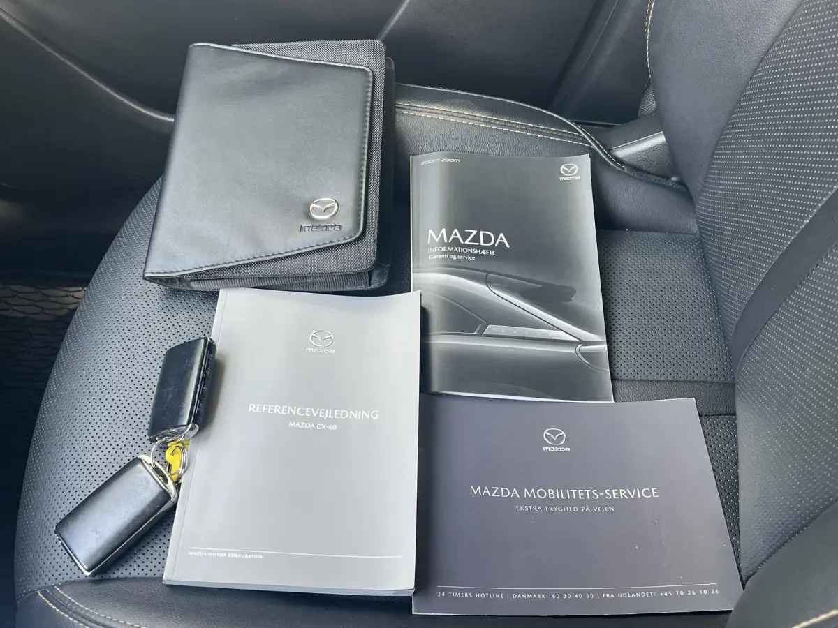 2.5 e-SkyActiv PHEV Homura / Leder / 2.500 kg trekgewicht / Camera 360° / Elektrische stoelen, stuur & klep / Stoelventilatie / Stuur-, stoel- & achterbankverwarming / Apple Carplay Android