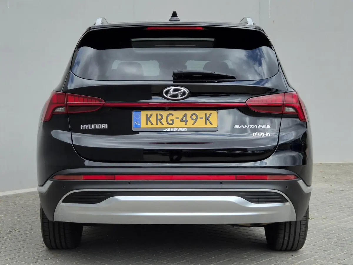 1.6 T-GDI PHEV Premium Sky / SOH 100% / Dealer onderhouden / Glazen schuif- en kanteldak / Head Up Display / Trekgewicht 1350 kg / Elektrische achterklep / Stuur- Stoel & Achterbank verwarmi
