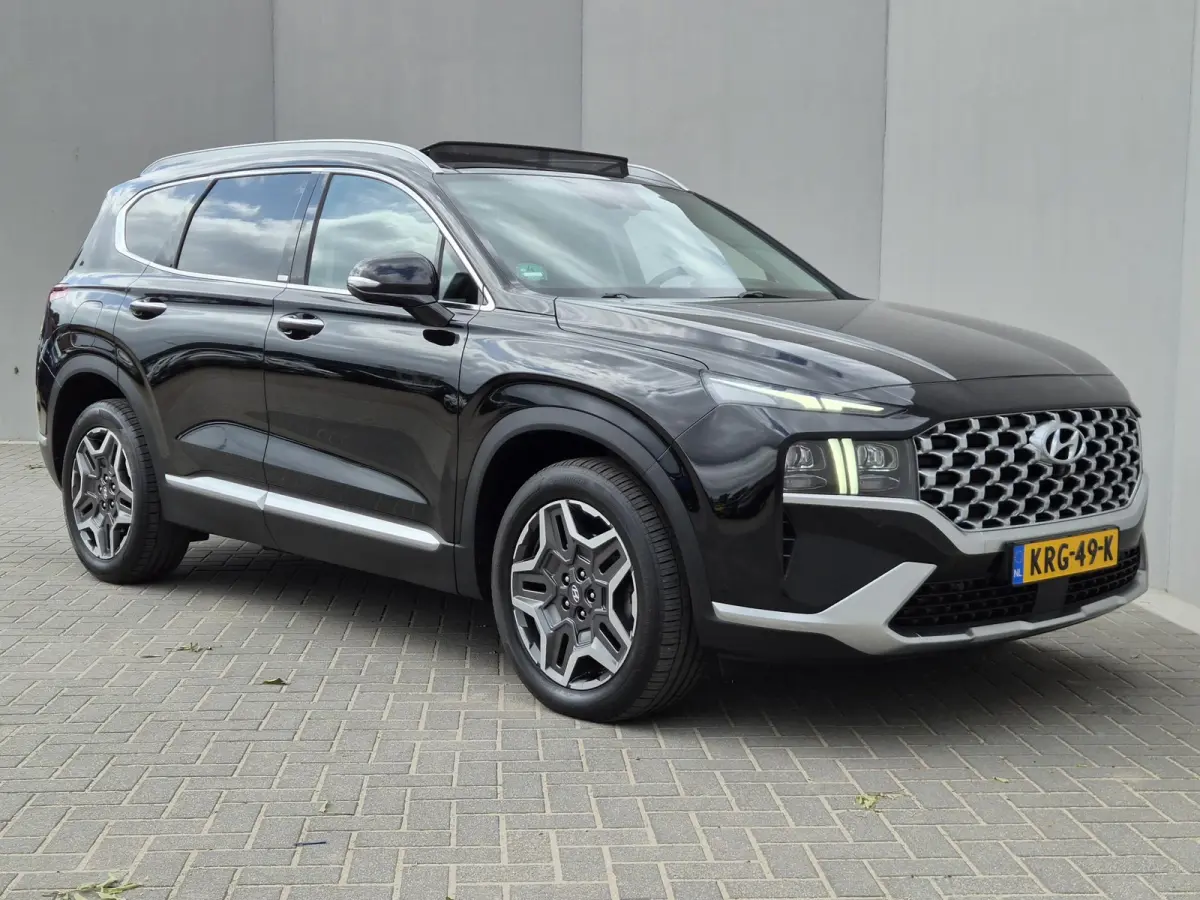 1.6 T-GDI PHEV Premium Sky / SOH 100% / Dealer onderhouden / Glazen schuif- en kanteldak / Head Up Display / Trekgewicht 1350 kg / Elektrische achterklep / Stuur- Stoel & Achterbank verwarmi
