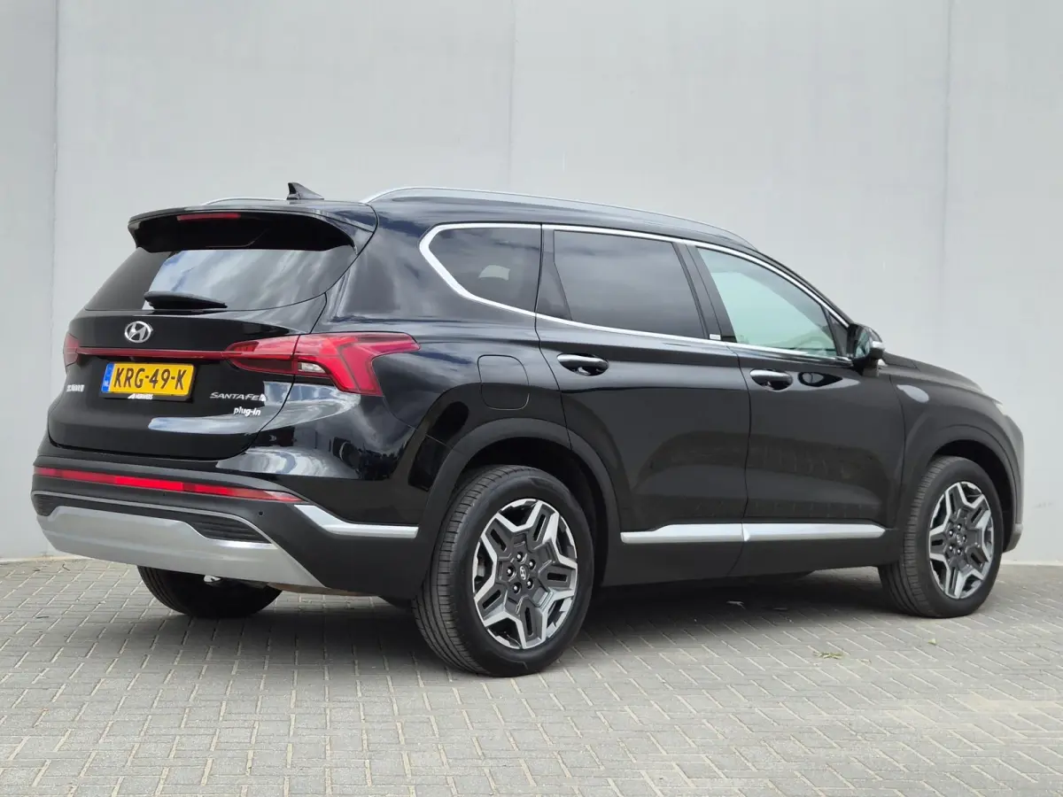 1.6 T-GDI PHEV Premium Sky / SOH 100% / Dealer onderhouden / Glazen schuif- en kanteldak / Head Up Display / Trekgewicht 1350 kg / Elektrische achterklep / Stuur- Stoel & Achterbank verwarmi