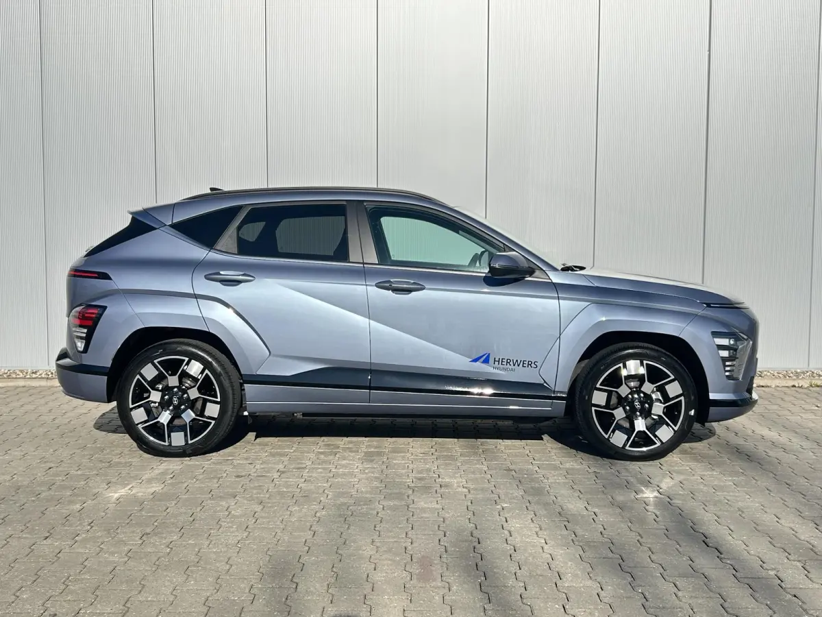 Comfort Smart 65.4 kWh / Navigatie / Cruise Control Adaptief / Climate Control / Achterklep Elektrisch / Stoel & Stuurwiel Verwarming Voorzijde /