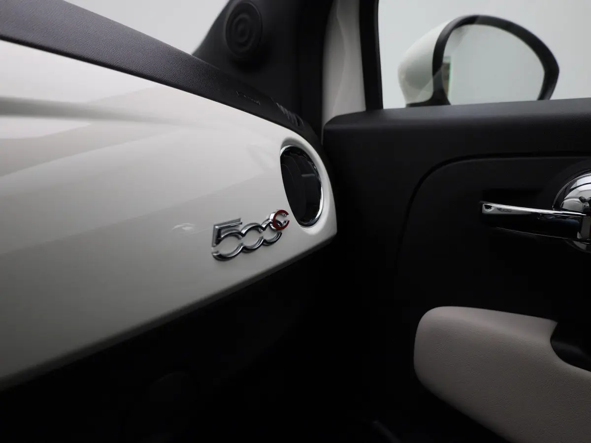 1.0 Hybrid Dolcevita | Cabrio | Parkeer sensoren | LMV | DAB | Bluetooth | Airco | Cruise control