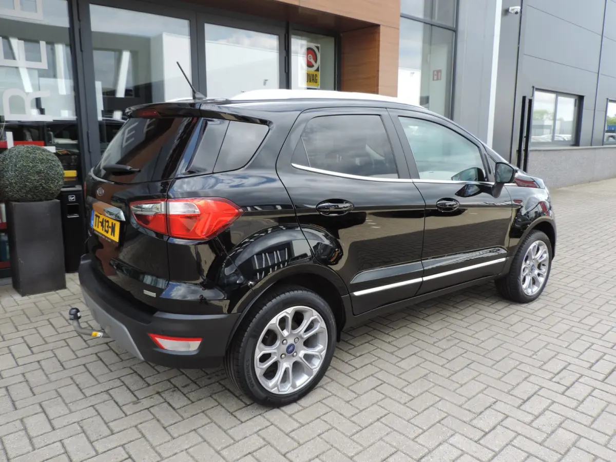 1.0-T 125PK Titanium 66.000km | Afn.th | Winterpack | Cruise | B&O | Dodehoek | CarPlay | Priv.glas | ECC | Halfleer