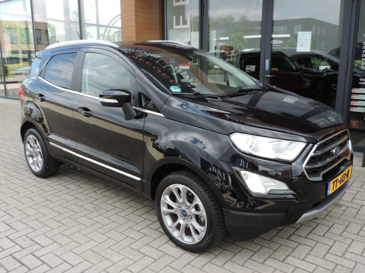 1.0-T 125PK Titanium 66.000km | Afn.th | Winterpack | Cruise | B&O | Dodehoek | CarPlay | Priv.glas | ECC | Halfleer