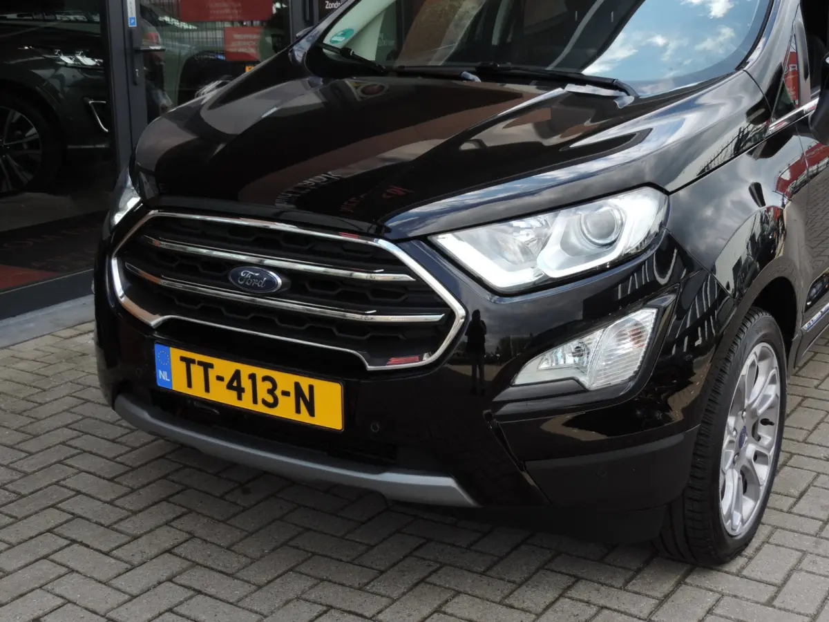 1.0-T 125PK Titanium 66.000km | Afn.th | Winterpack | Cruise | B&O | Dodehoek | CarPlay | Priv.glas | ECC | Halfleer
