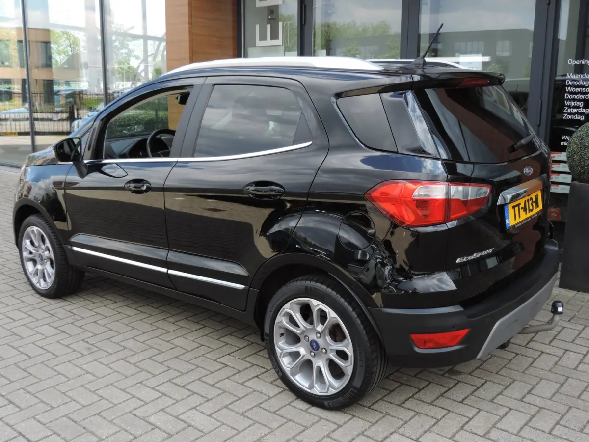 1.0-T 125PK Titanium 66.000km | Afn.th | Winterpack | Cruise | B&O | Dodehoek | CarPlay | Priv.glas | ECC | Halfleer