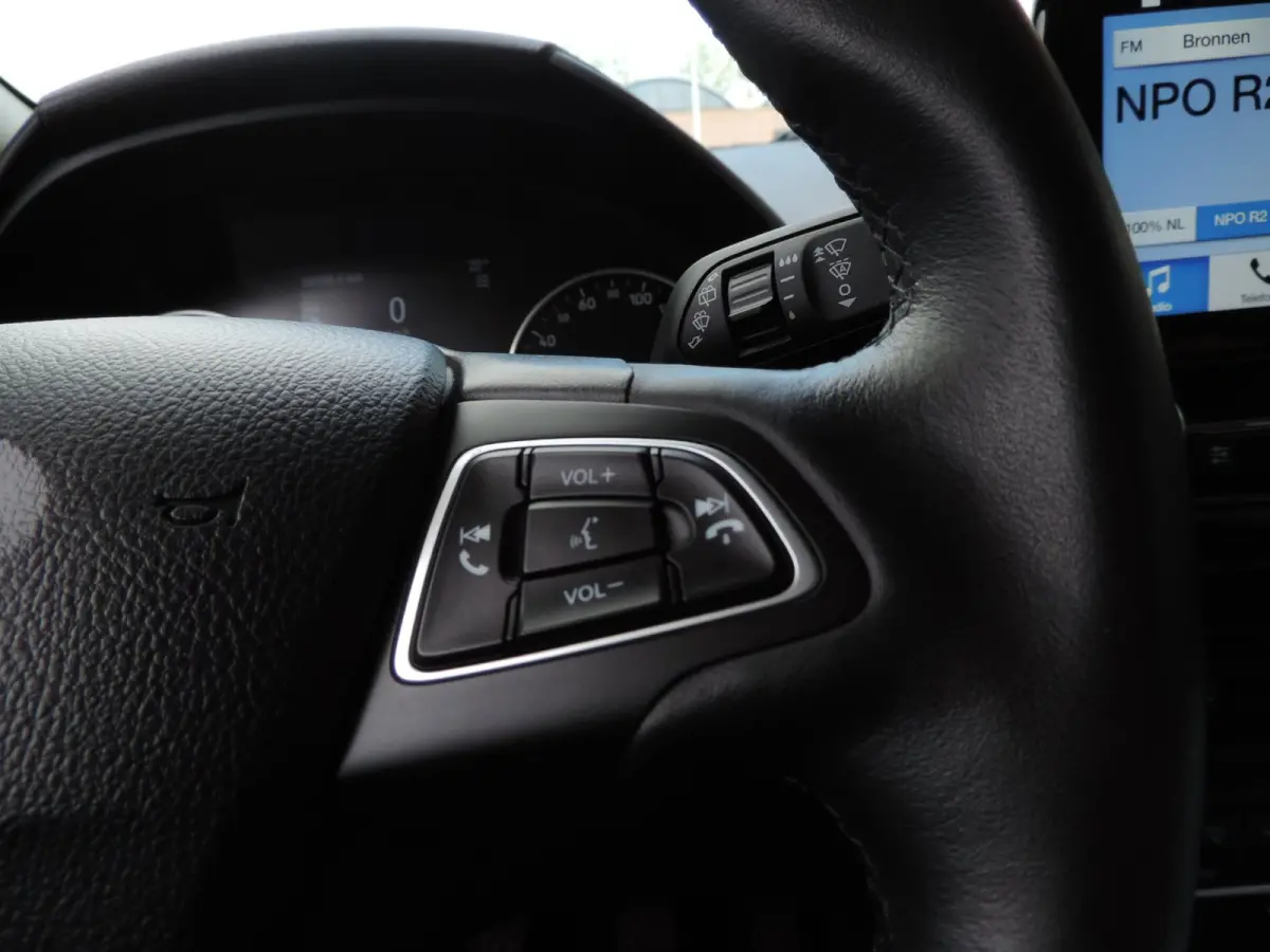 1.0-T 125PK Titanium 66.000km | Afn.th | Winterpack | Cruise | B&O | Dodehoek | CarPlay | Priv.glas | ECC | Halfleer