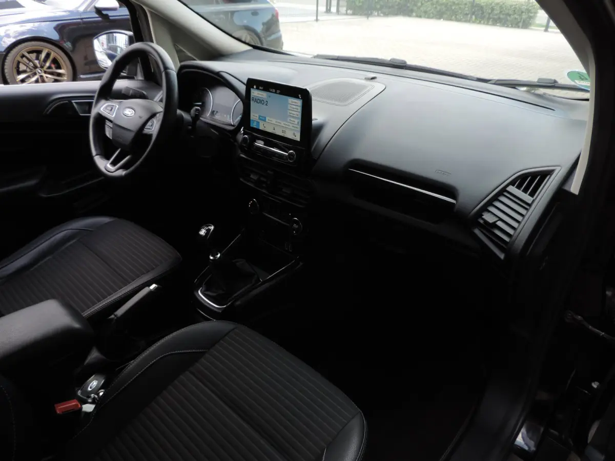 1.0-T 125PK Titanium 66.000km | Afn.th | Winterpack | Cruise | B&O | Dodehoek | CarPlay | Priv.glas | ECC | Halfleer