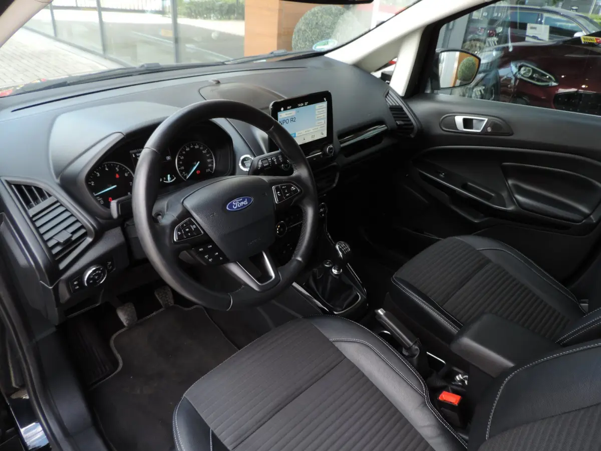 1.0-T 125PK Titanium 66.000km | Afn.th | Winterpack | Cruise | B&O | Dodehoek | CarPlay | Priv.glas | ECC | Halfleer
