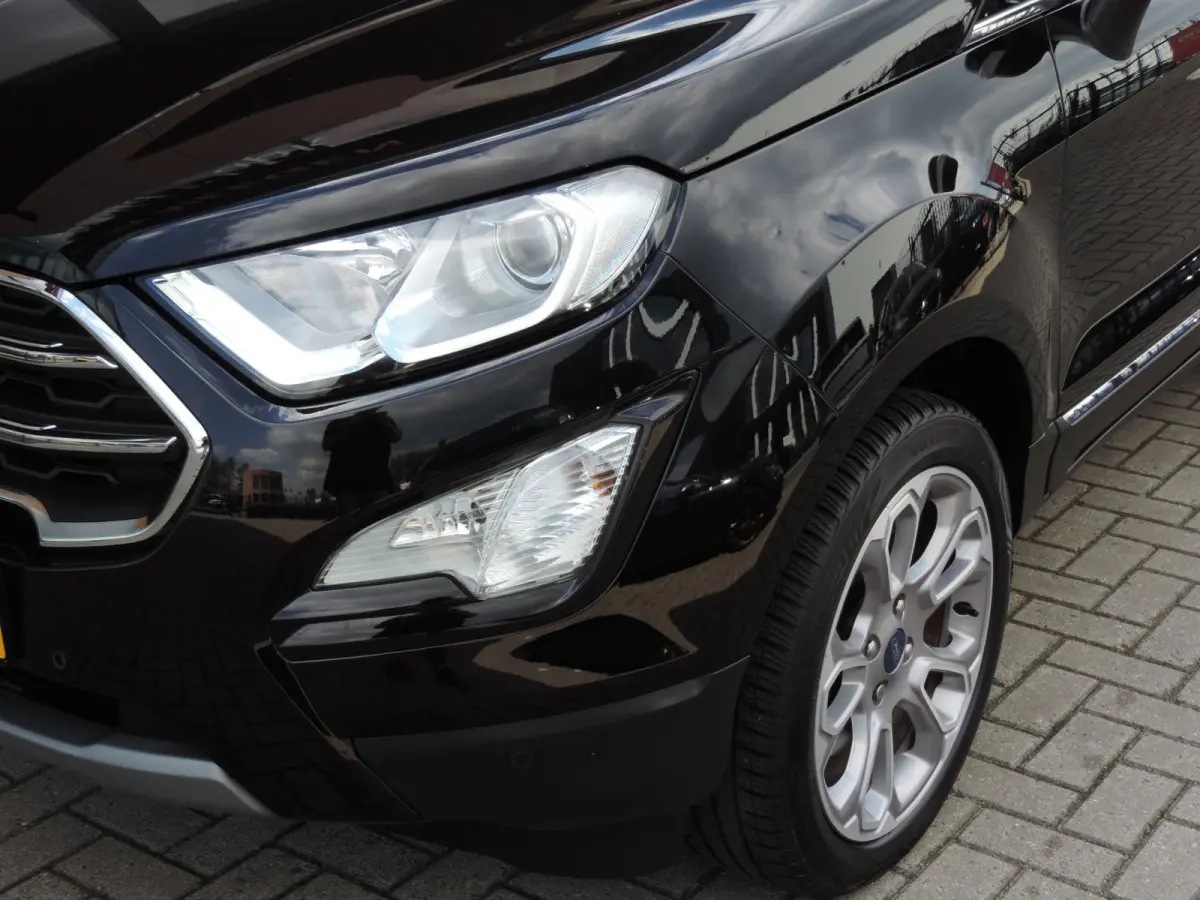 1.0-T 125PK Titanium 66.000km | Afn.th | Winterpack | Cruise | B&O | Dodehoek | CarPlay | Priv.glas | ECC | Halfleer