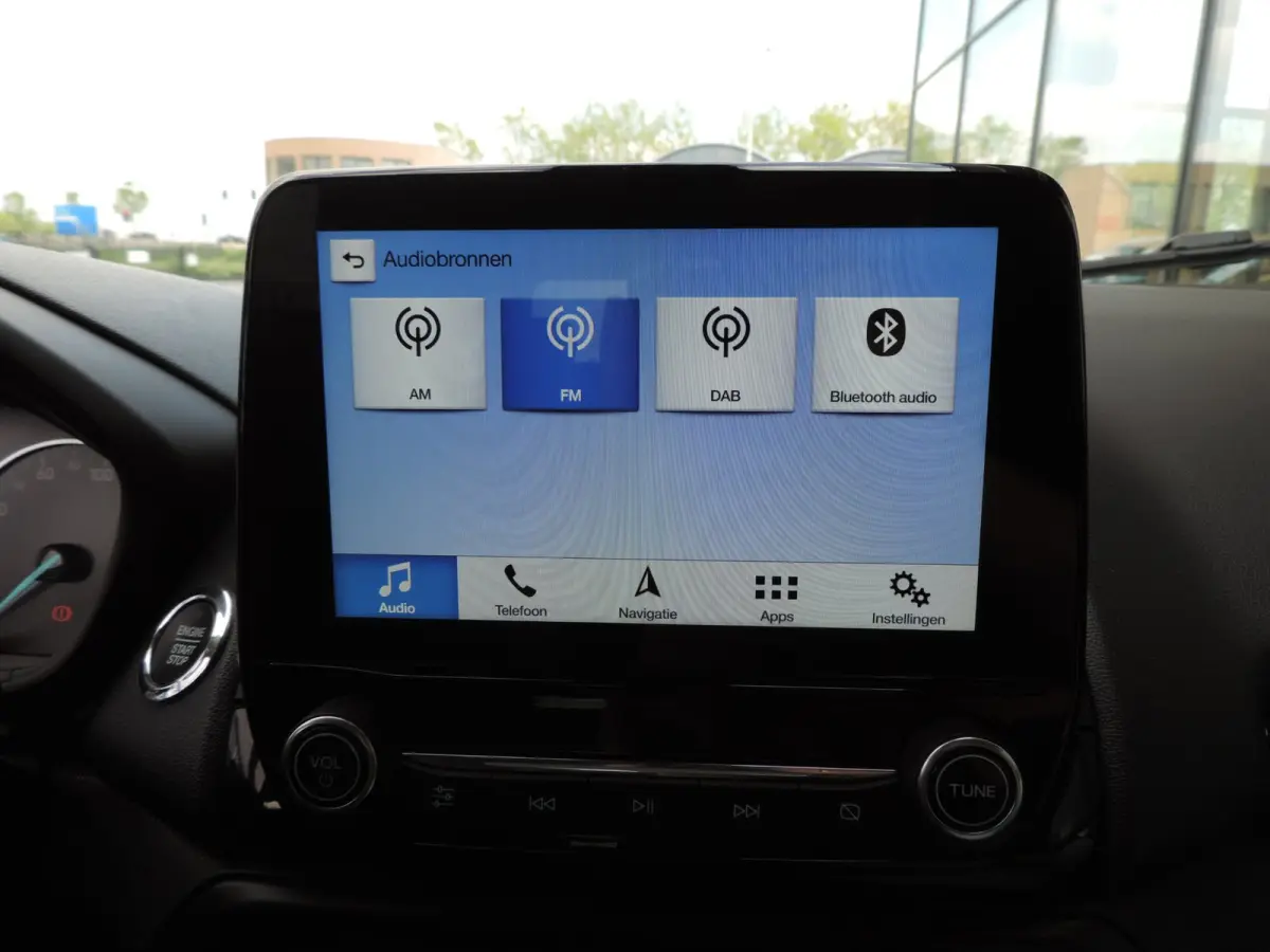 1.0-T 125PK Titanium 66.000km | Afn.th | Winterpack | Cruise | B&O | Dodehoek | CarPlay | Priv.glas | ECC | Halfleer